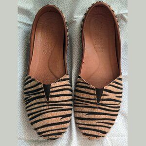 Spring Step Kathaleta tiger-print slip-on shoes.